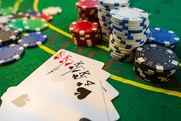 Over Under live dealer game on liga778 login mobile app showing card prediction interface on iOS and Android